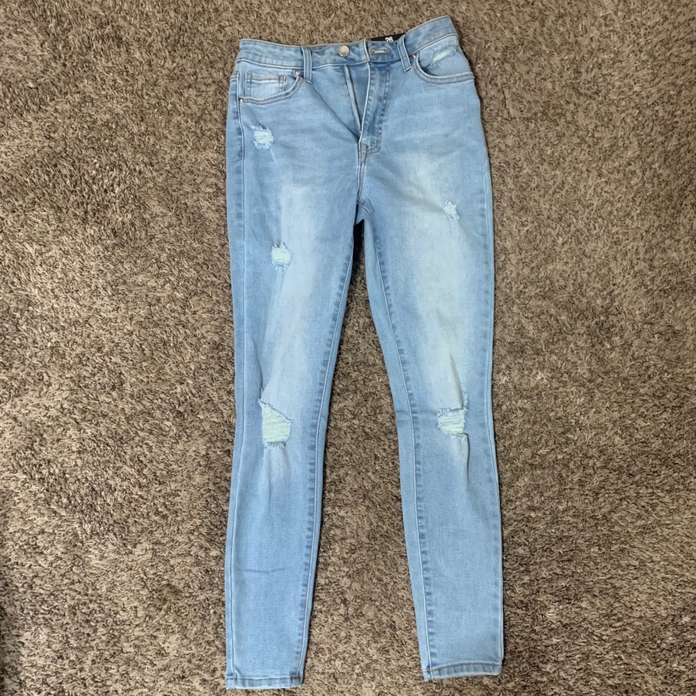 Light wash distressed jeans